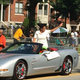 Cheryl Mainor waves during a Chicago tradition, August's Bud Billiken Day parade. (Credit: Twitter)